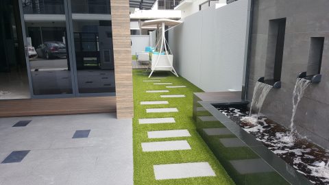 Landscaped astroturf garden at Luxus Avenue, Singapore
