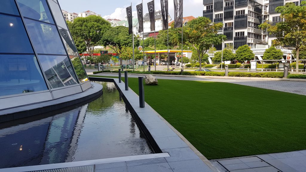 Landmark artificial-grass lawn at a Mercedes-Benz showroom forecourt, Singapore
