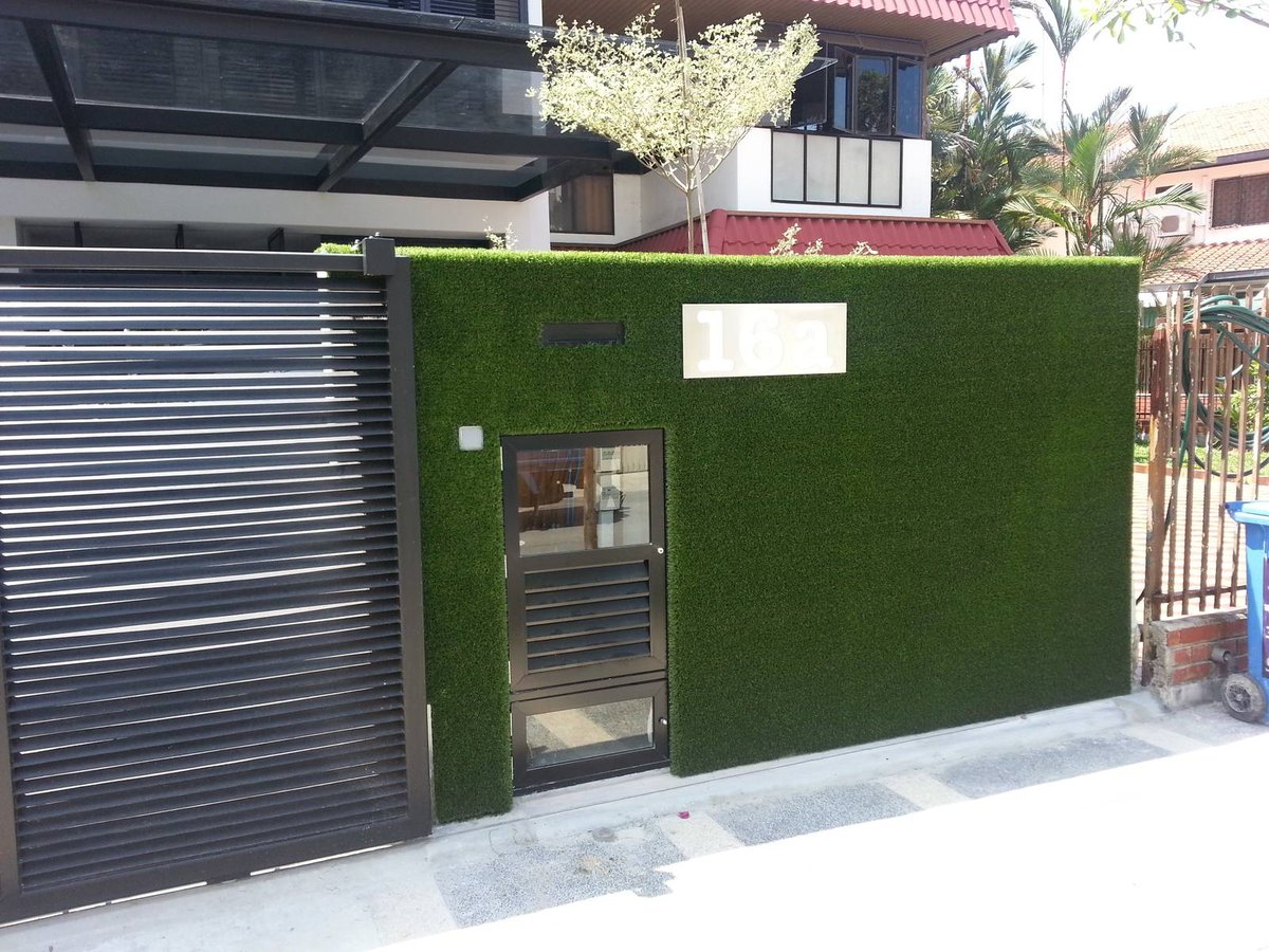 Artificial hedge boundary screen at Woo Mon Chew Road, Singapore