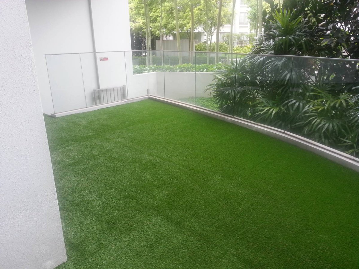 Artificial grass balcony at The Oceanfront, Sentosa Cove, Singapore