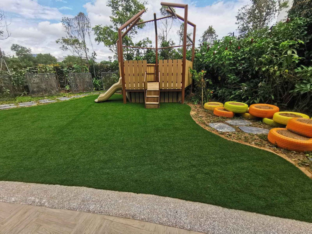 Artificial grass rooftop play deck at NTUC childcare, Punggol Road, Singapore