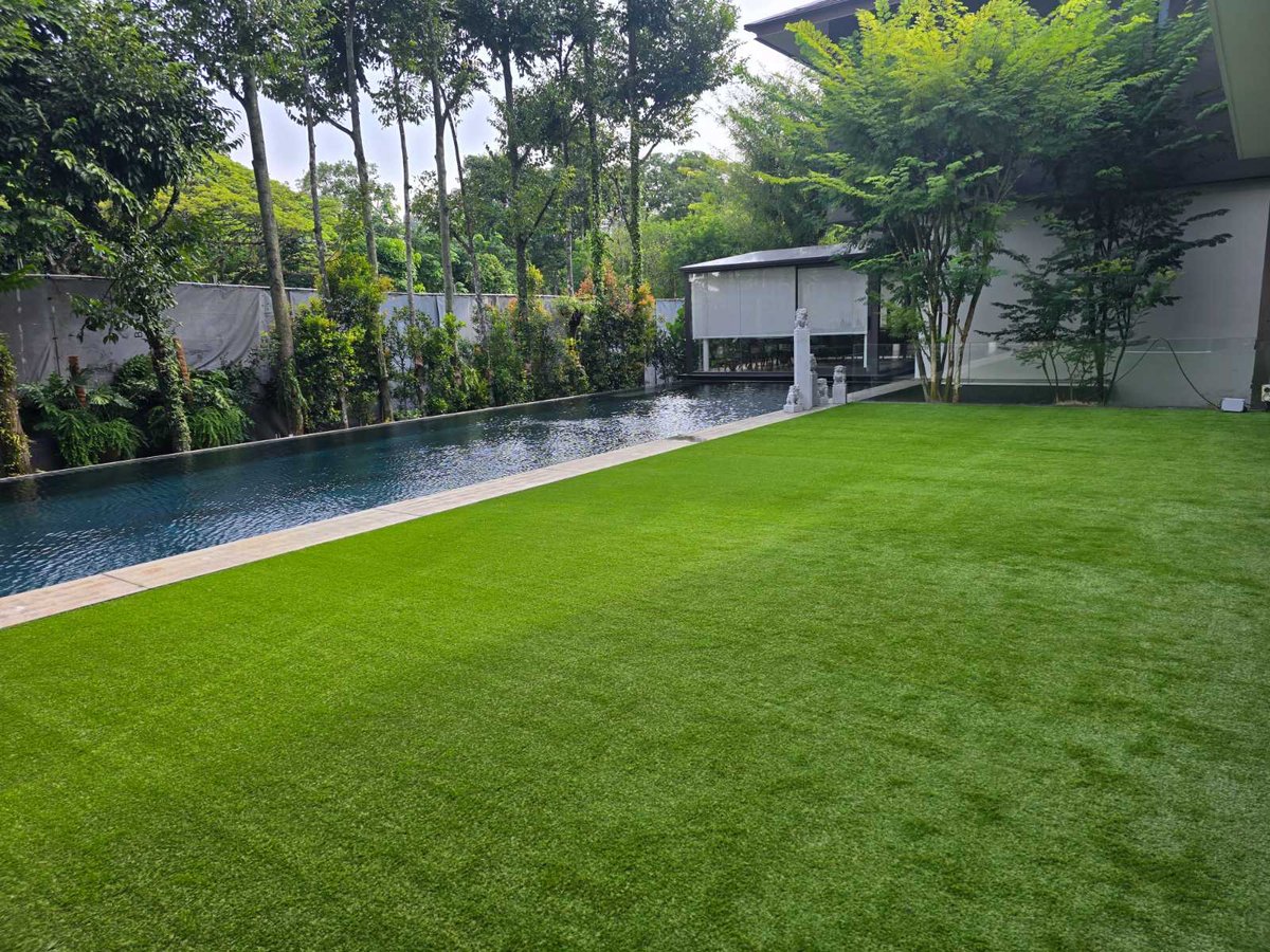 Artificial grass installation beside a pool at Tanglin Hill, Singapore
