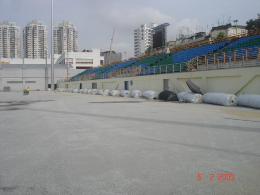 Turf rolls staged along the field edge ready for rollout at Jalan Besar Stadium, February 2009